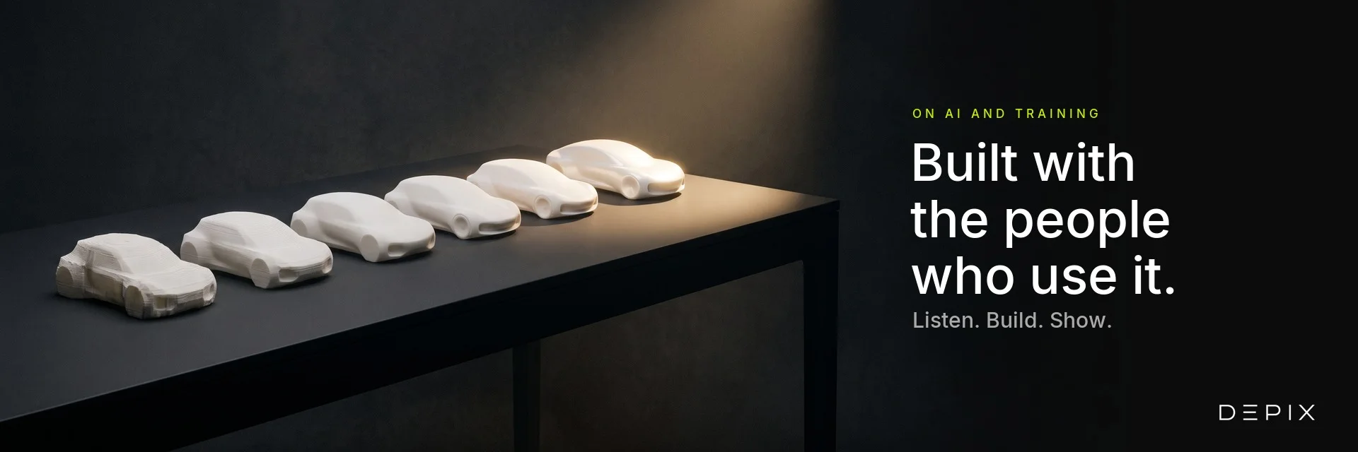 Six white clay car models in a row on a dark table, the last one lit